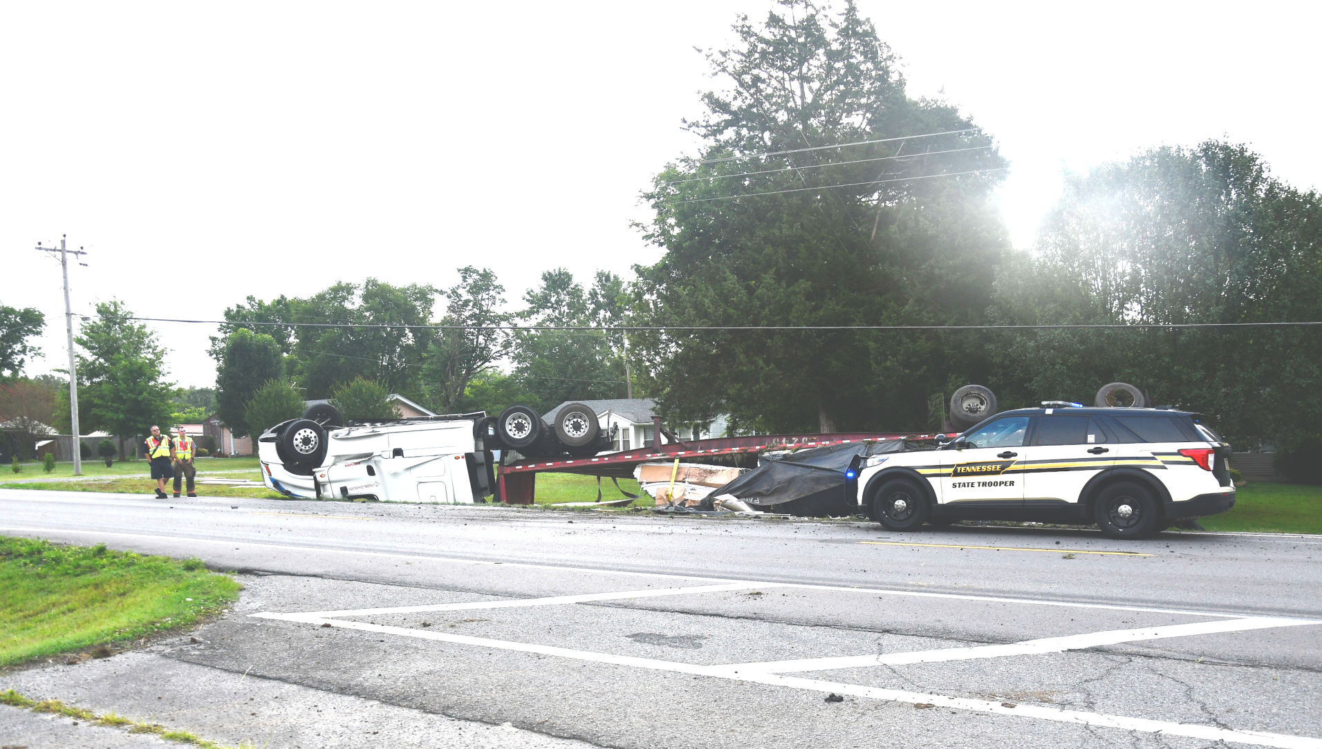 Truck overturns
